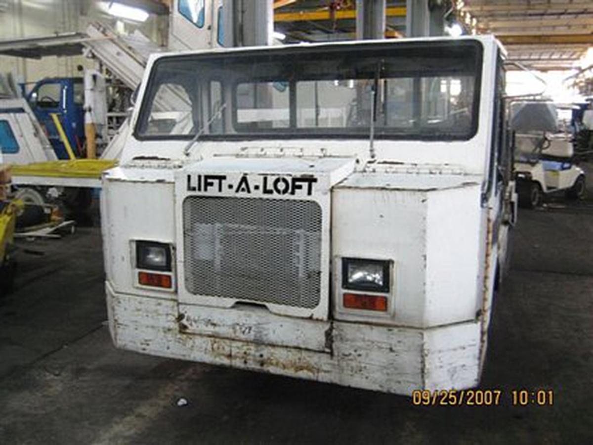 2000 Lift-A-Loft APV Flat Bed